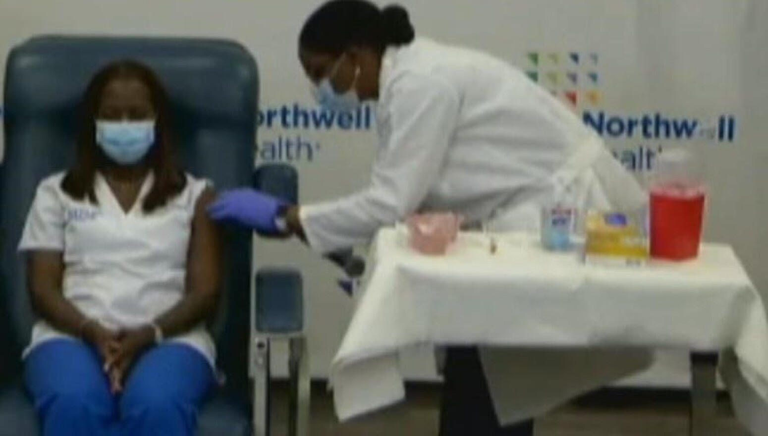 Sandra Lindsay, a nurse in Queens, receives the first COVID-19 vaccine on Monday, Dec. 14.